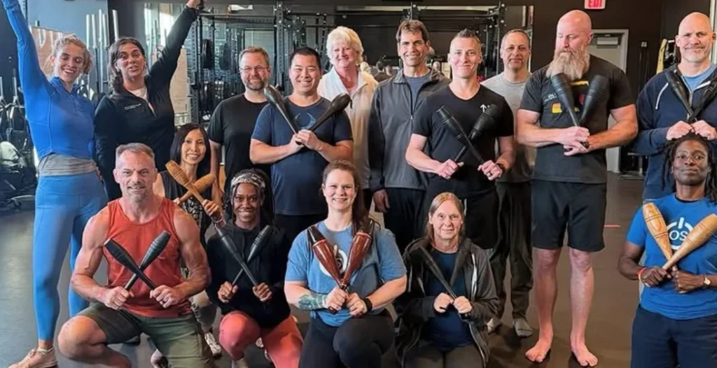 Group photo of Indian clubs and mace training workshop participants 