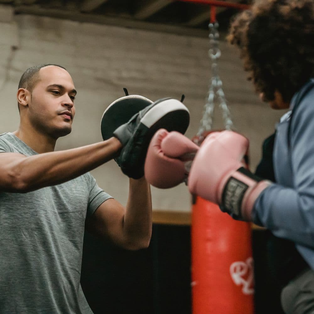 Muay Thai personal training session for stress relief and fitness at a NYC boxing gym